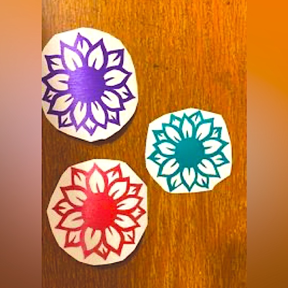 Sunflower stickers. Any color, medium size, able to be put on bottles, cases ect